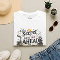The Secret to Getting Ahead Unisex Softstyle T-Shirt